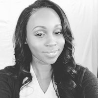 a black and white photo of a woman with long hair
